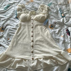 Dress Size S NEW WITH TAGS.Color cream.Amazing for spring and summer, cute dress